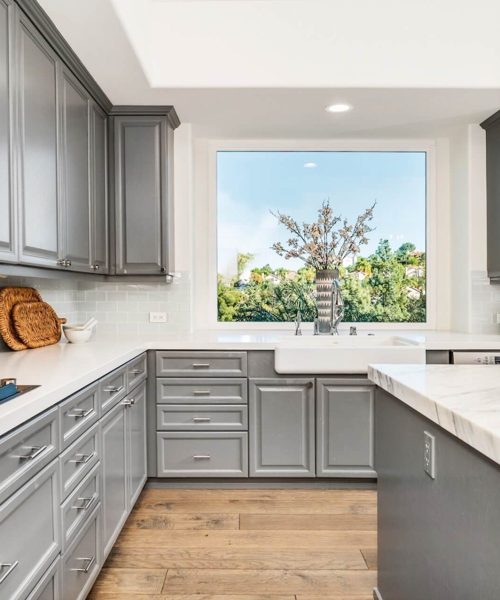 modern-marble-kitchen-with-sleek-gray-cabinets-2025-02-11-19-46-17-utc